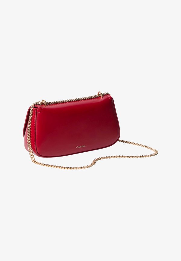 Calvin Klein CURVED WALLET ON CHAIN - Cross body bag - bordeaux wine