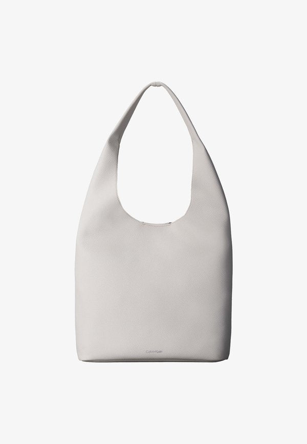 Calvin Klein SLOUCHY PEBBLE MEDIUM - Tote bag - white alyssum
