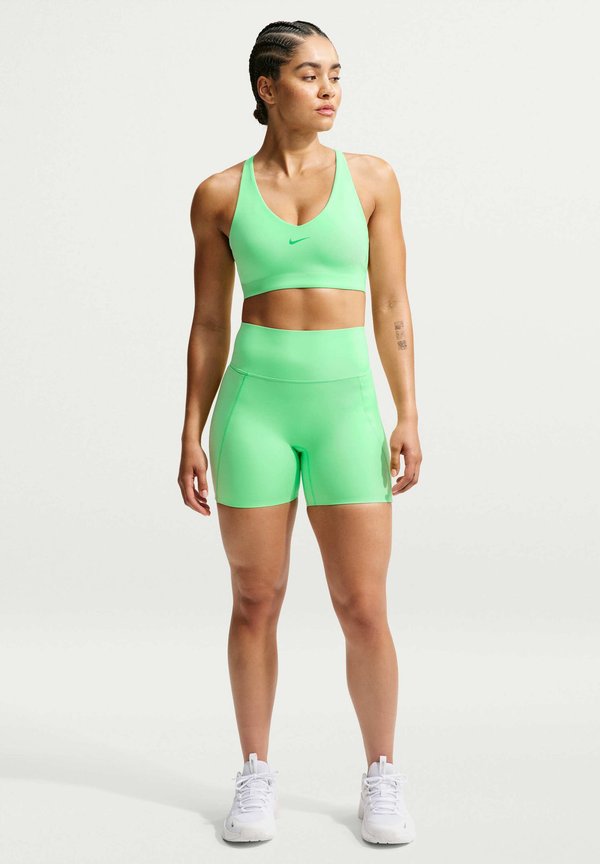 Nike Performance W NK DF UNVRSA MS BRA - Medium support sports bra - illusion green/lt green spark/green spark