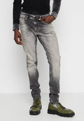 Ausgebleichte graue Jeans mit einem verwaschenen Finish. Verfügt über ein Fünf-Taschen-Design, Gürtelschlaufen und kontrastierende Nähte.