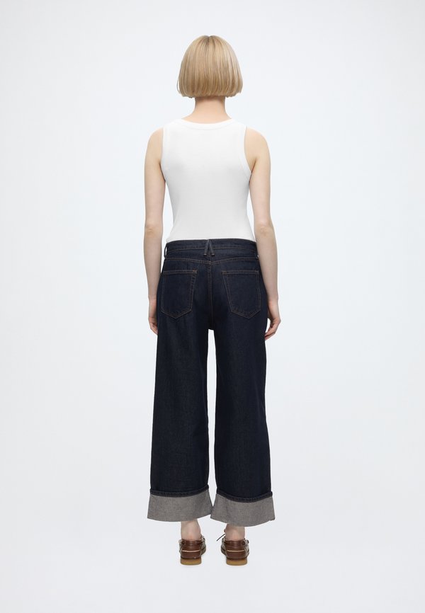 Good American GOOD STANDARD BAGGY CUFFED JEANS