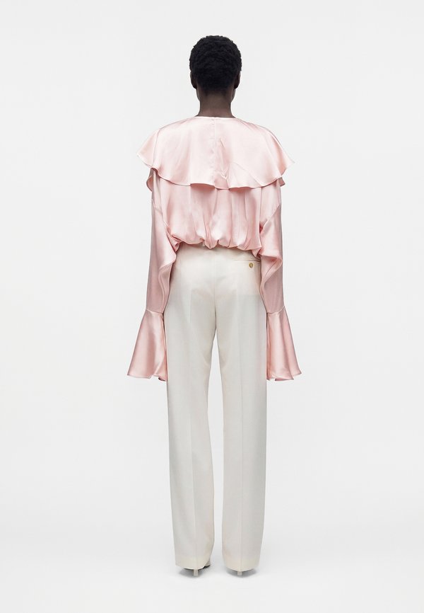 Norma Kamali LONG SLEEVE DEEP V RUFFLE BODYSUIT