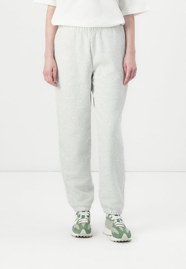 New Balance SPORT ESSENTIALS JOGGER - Tracksuit bottoms - grey