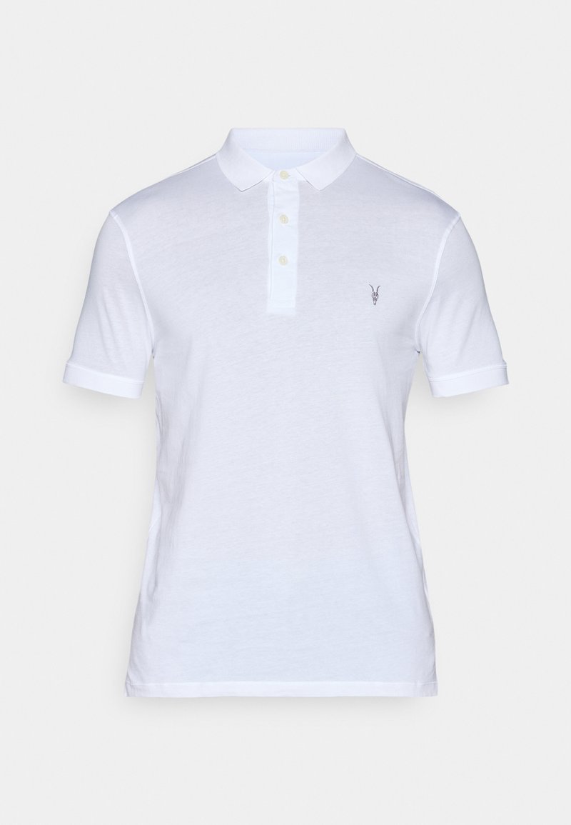 Weißes Poloshirt aus weichem Baumwollstoff, mit einer Drei-Knopf-Leiste, kurzen Ärmeln und einem kleinen gestickten Logo auf der Brust.