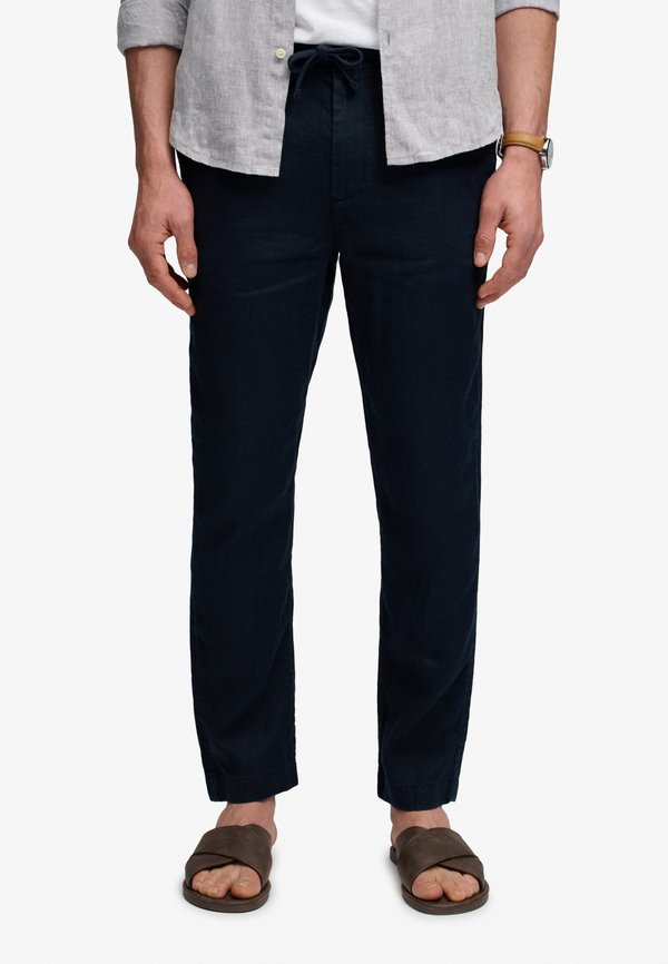 Superdry & Co M7011509A . - Trousers - bleu