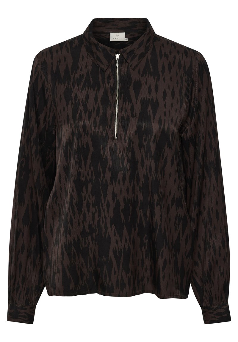 Langärmlige Bluse in Schwarz mit einem braunen Ikat-Muster. Hat einen kragenförmigen Ausschnitt und einen Halb-Zip-Verschluss. Sanfte Stofftextur.