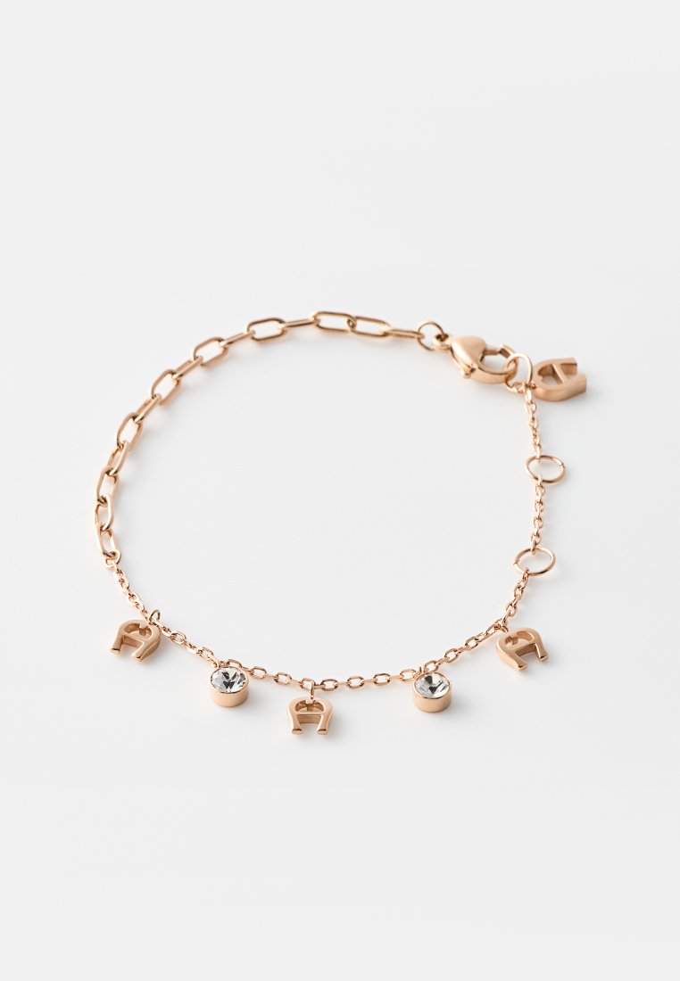 Zartes Armband aus Roségold mit abwechselnden Hufeisenanhängern und runden klaren Kristallen an einer dünnen Kette mit Karabinerverschluss.