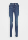 Dunkelblaue Skinny-Jeans mit hoher Taille, ausgestattet mit einer abgedunkelten Textur, dezenten Auswaschungen und fransigem Saum an den Knöcheln.