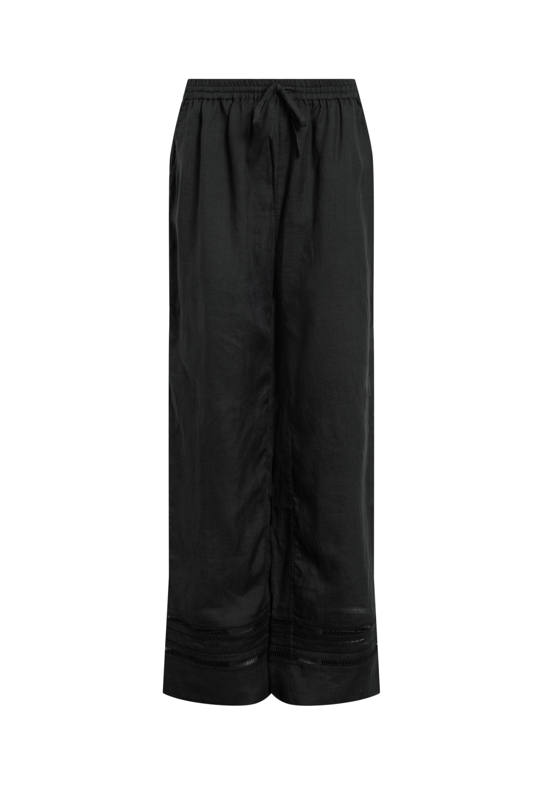 Schwarze weit geschnittene Hosen aus leichtem Stoff, mit einem Kordelzugbund und dekorativen Nähten am Saum.
