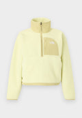 Hellgelber Fleece-Pullover mit halbem Reißverschluss, hohem Kragen und beiger Brusttasche mit The North Face Logo.