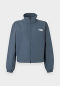 Blaue Jacke mit durchgehendem Reißverschluss, hohem Kragen, elastischen Bündchen und weißem The North Face-Logo auf der linken Brust.