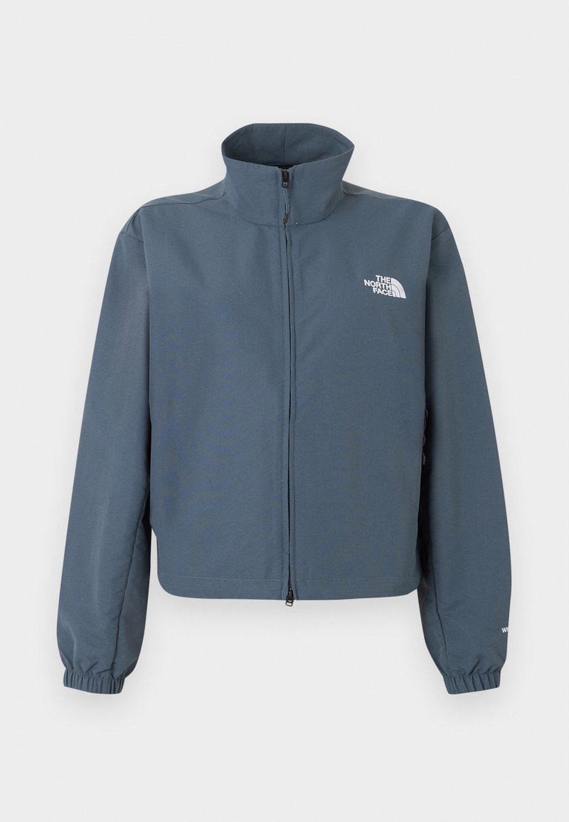 Blaue Jacke mit durchgehendem Reißverschluss, hohem Kragen, elastischen Bündchen und weißem The North Face-Logo auf der linken Brust.
