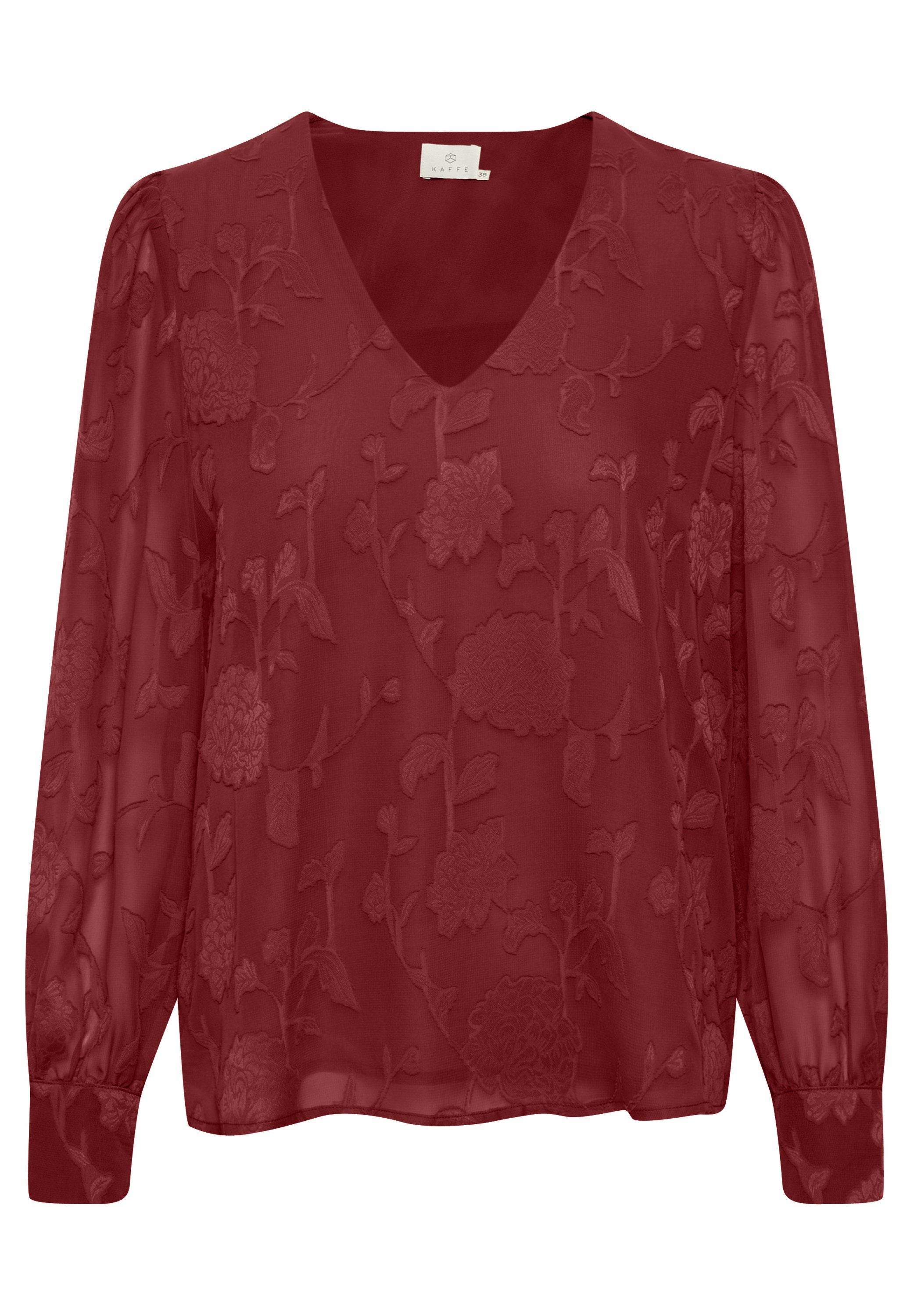 Rote transparente Bluse mit langen Ärmeln, V-Ausschnitt und floral gesticktem Muster. Die Bündchen sind mit einem elastischen Detail für eine engere Passform ausgestattet.