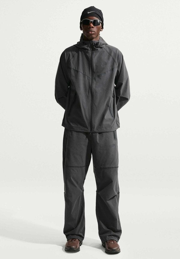 Nike Sportswear M NK DF TCH WVN WR FZ JKT - Summer jacket - black black black