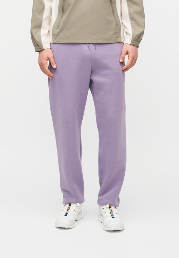 New Balance SPORT ESSENTIALS JOGGER - Tracksuit bottoms - candied violet