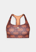 Braun Sport-BH mit orangefarbenem Palmenmuster, Racerback-Design und heller Innenauskleidung. Verfügt über ein kleines goldenes Logo auf der Vorderseite.