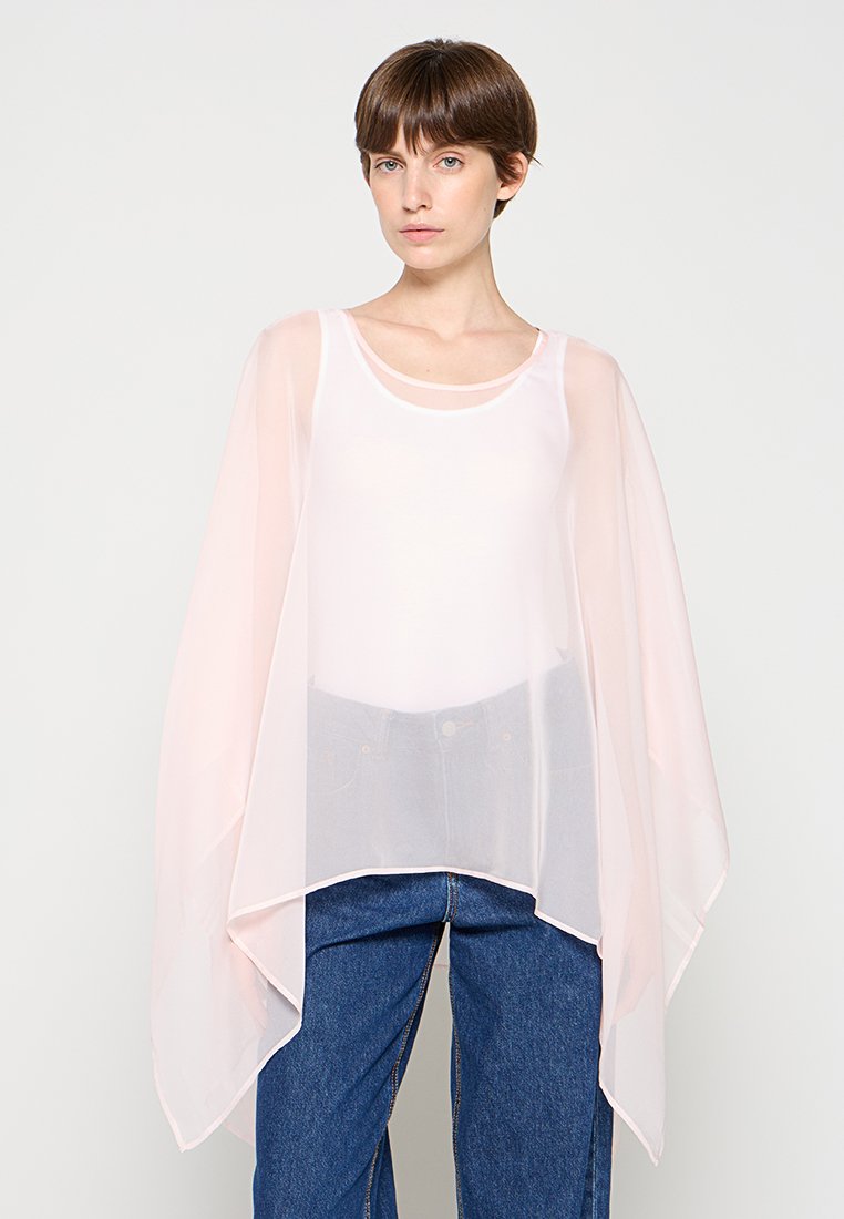 comma Cape Media 1