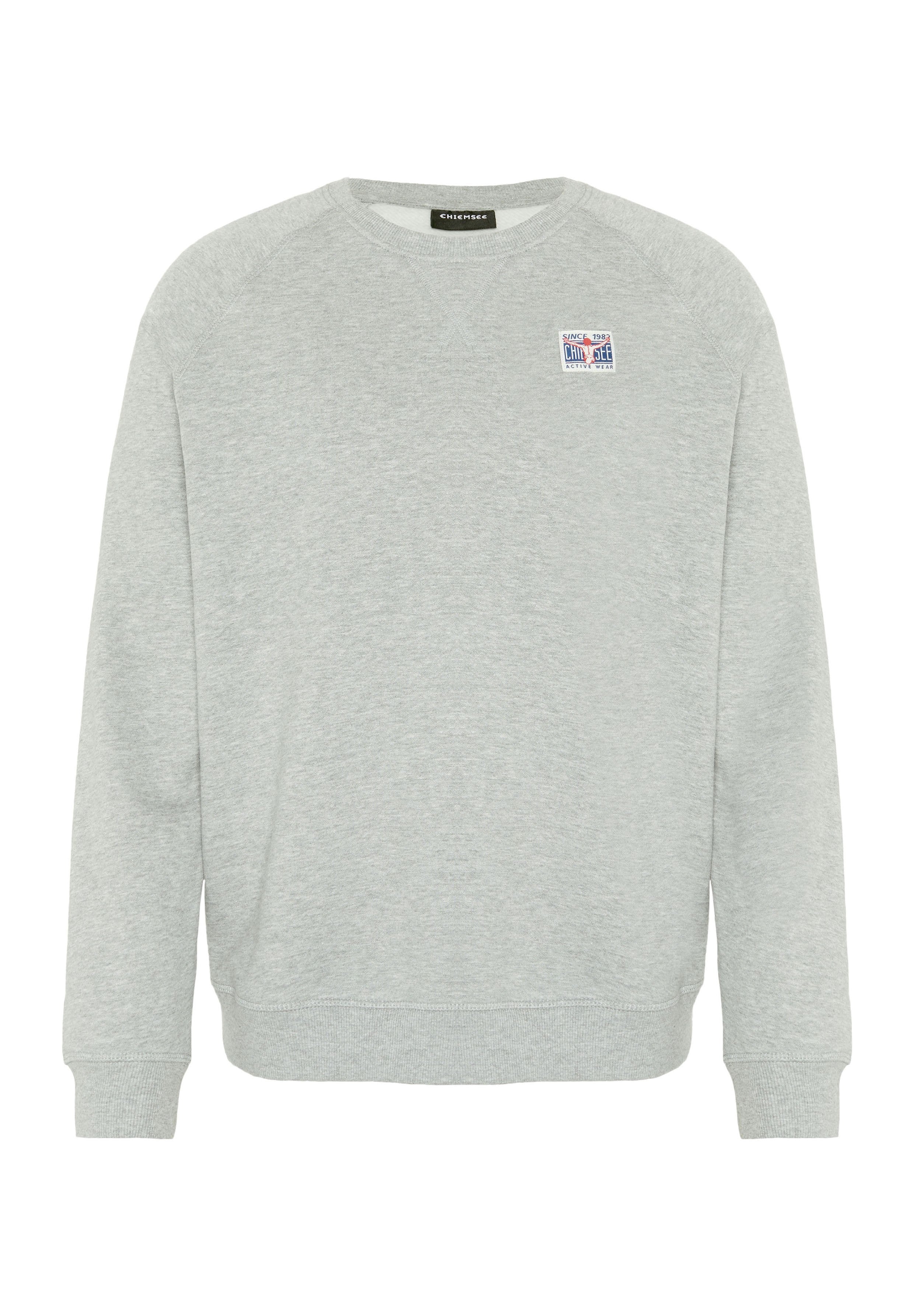Hellgrauer Pullover mit langen Ärmeln, gerippten Bündchen und Saum, mit einem kleinen mehrfarbigen Logo auf der Brust. Weiches Material aus Baumwollmischung.