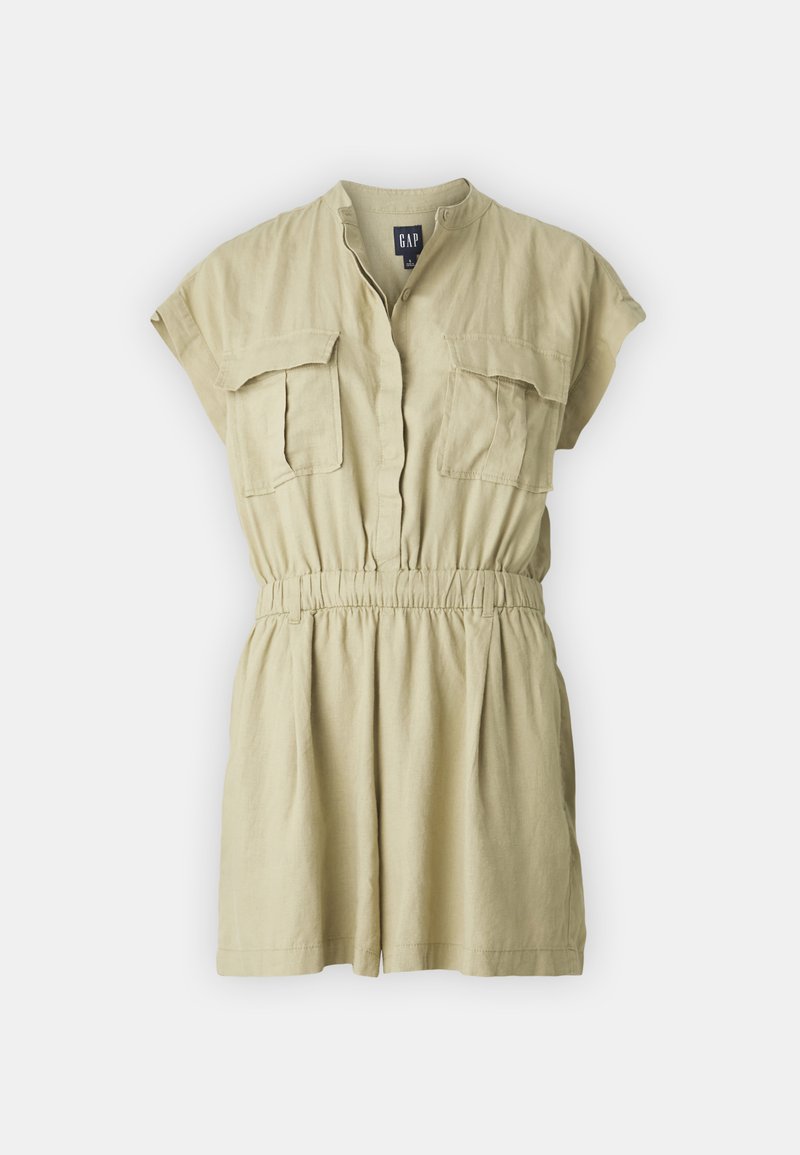 Kurzer, leichter Jumpsuit in Beige mit kurzen Ärmeln, zwei Vorderfel Taschen und einem elastischen Bund für einen bequemen Sitz.
