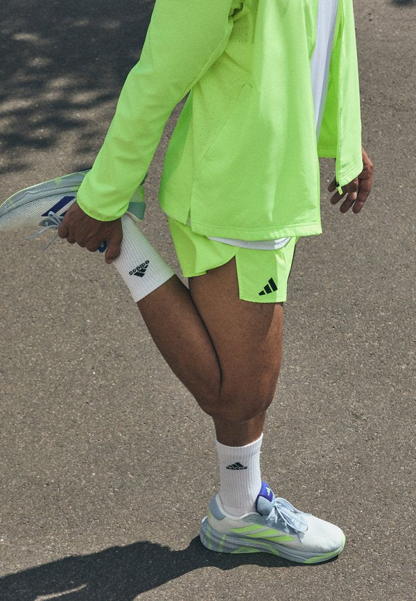 adidas Performance ADIZERO SPLIT  - Sports shorts - lucid lemon