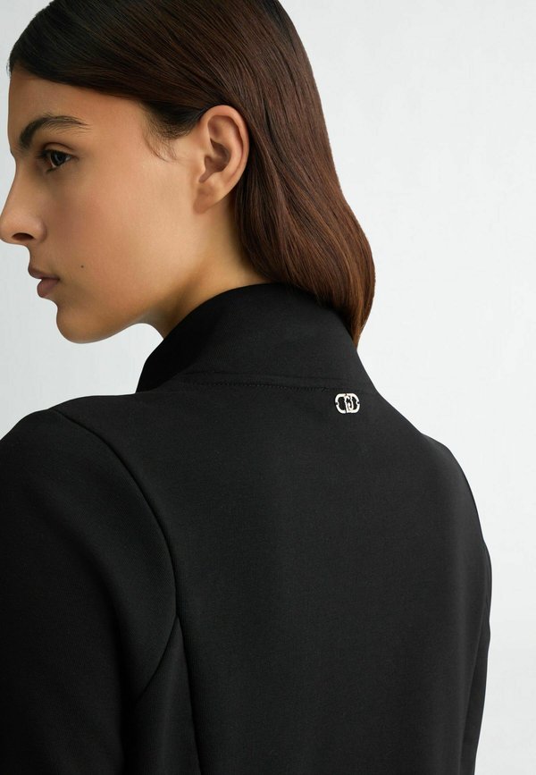 LIU JO WITH ZIP AND RHINESTONES