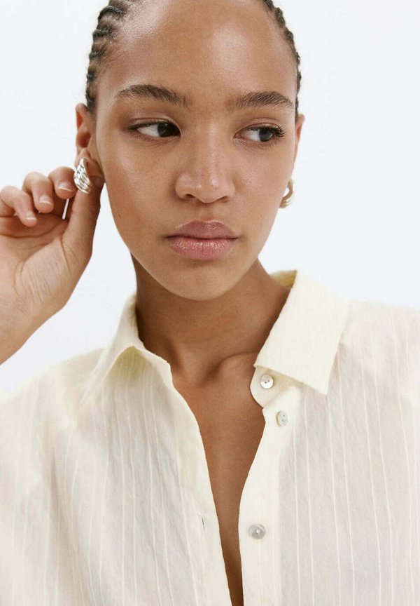 Mango ADULT - Button-down blouse - beige