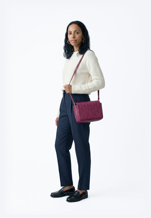 Calvin Klein EMBLEM PUFFER FLAP - Cross body bag - alluring pink