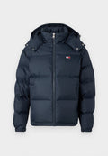 Dunkelblaues Steppjacke mit Reißverschluss, Kapuze und gepolstertem Design. Verfügt über ein Logo-Patch auf der Brust und Druckknöpfe an der Kapuze.