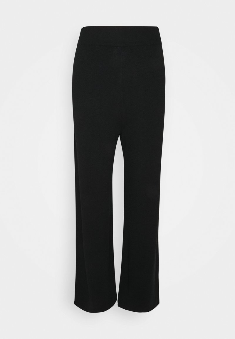 Schwarze, weit geschnittene Hose aus einem weichen, elastischen Stoff mit einem elastischen Bund. Keine Muster oder Hardwaredetails vorhanden.