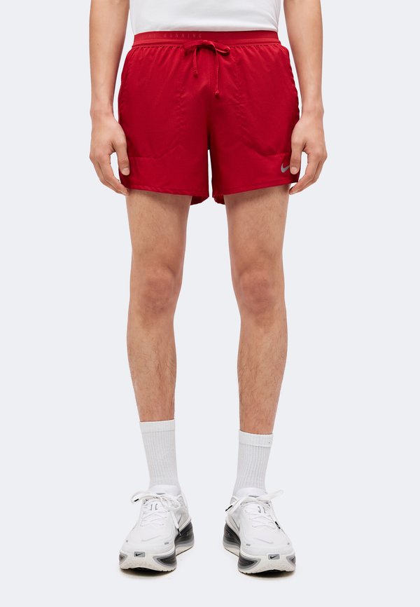 Nike Performance STRIDE SHORT - Sports shorts - tough red