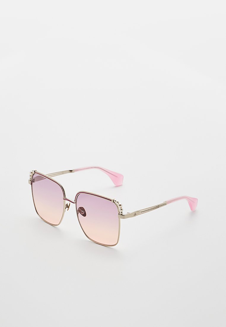 Rosa und goldene Sonnenbrille mit quadratischen Gläsern, verlaufender Tönung, dekorativen Perlenakzenten am Rahmen und pinken Kunststoffscharnieren.