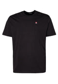 Schwarzes Baumwoll-T-Shirt mit Rundhalsausschnitt, kurzen Ärmeln und einem kleinen roten Diesel-Logo auf der linken Brust. Leicht und schlicht im Design.