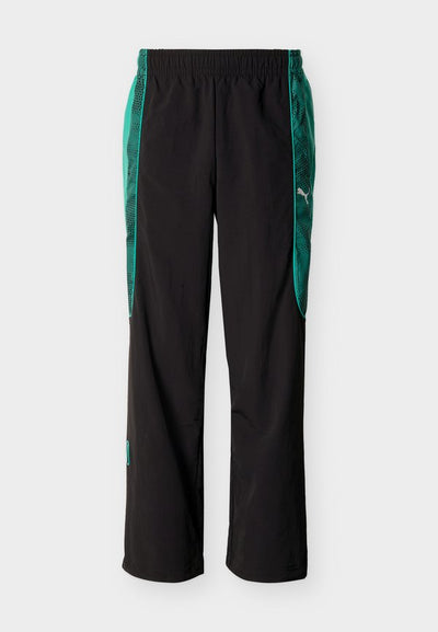 Puma PUMATECH-X RELAXED TRACK PANTS - Tracksuit bottoms - black