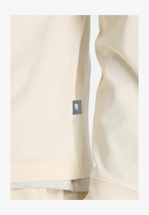 New Balance ATHLETICS PREMIUM BACK LOGO - Long sleeved top - permafrost
