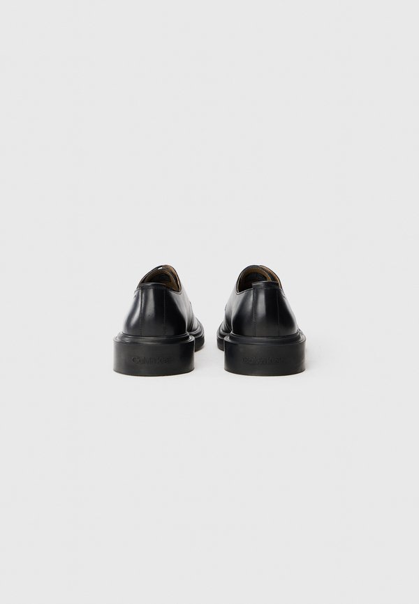 Calvin Klein CUPPED POSTMAN