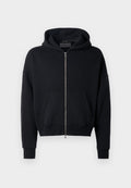 Schwarze Zip-Hoodie aus weichem Stoff mit einer Fronttasche, oversized Passform und einer runden Kapuze. Mit gerippten Bündchen und Saum.