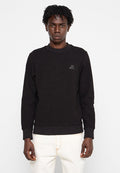 Schwarzer Ripp-Sweatshirt mit langen Ärmeln, rundem Halsausschnitt und kleinem "DIESEL"-Logo auf der Brust. Hergestellt aus strukturiertem Stoff.