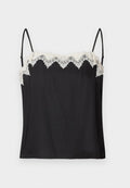 Schwarzes Camisole mit dünnen Trägern, verziert mit weißem, gewelltem Spitzenbesatz entlang des Ausschnitts. Glatter Stoff mit lockerem Schnitt.