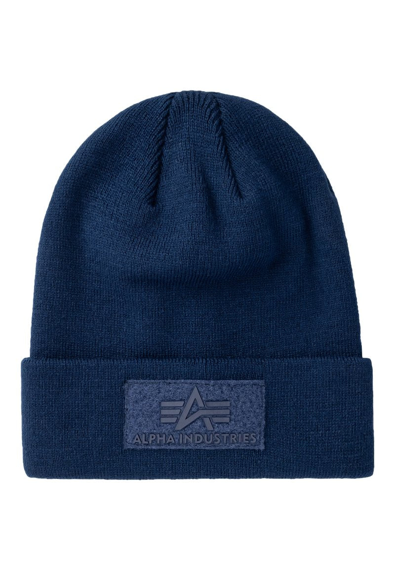 Navy Strickmütze mit umgeschlagenem Bund und strukturiertem Patch, das das Markenlogo in einem helleren Blauton zeigt. Weicher Stoff mit glatter Textur.