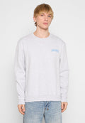 Grauer Sweatshirt aus Baumwollmischung mit langen Ärmeln und Rundhalsausschnitt. Auf der linken Brust befindet sich der Aufdruck "LES DEUX" in Hellblau.