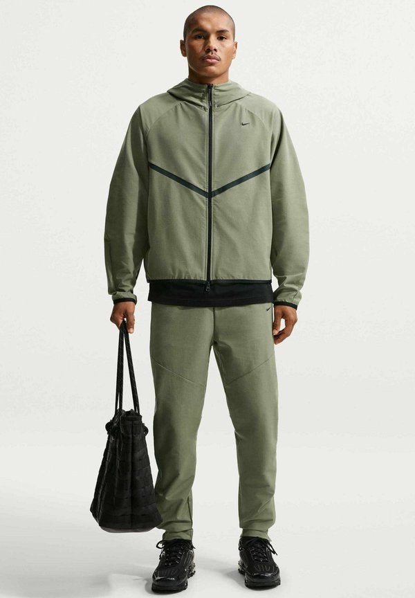 Nike Sportswear M NK TECH SHORI KNIT DRILL PNT - Tracksuit bottoms - silver sage black