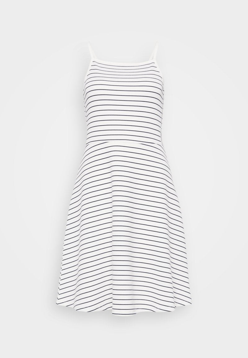 Gestreiftes ärmelloses Kleid in Weiß und Marineblau. Ein taillierter Oberteil geht in einen schwingenden Rock über. Hergestellt aus weichem, leichtem Stoff.