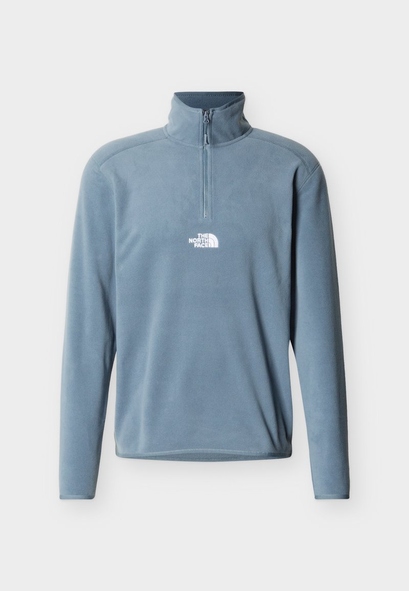Hellblauer Fleecepullover mit langen Ärmeln, hohem Kragen, vorderem Halbreißverschluss und weißem "The North Face"-Logo auf der Brust.