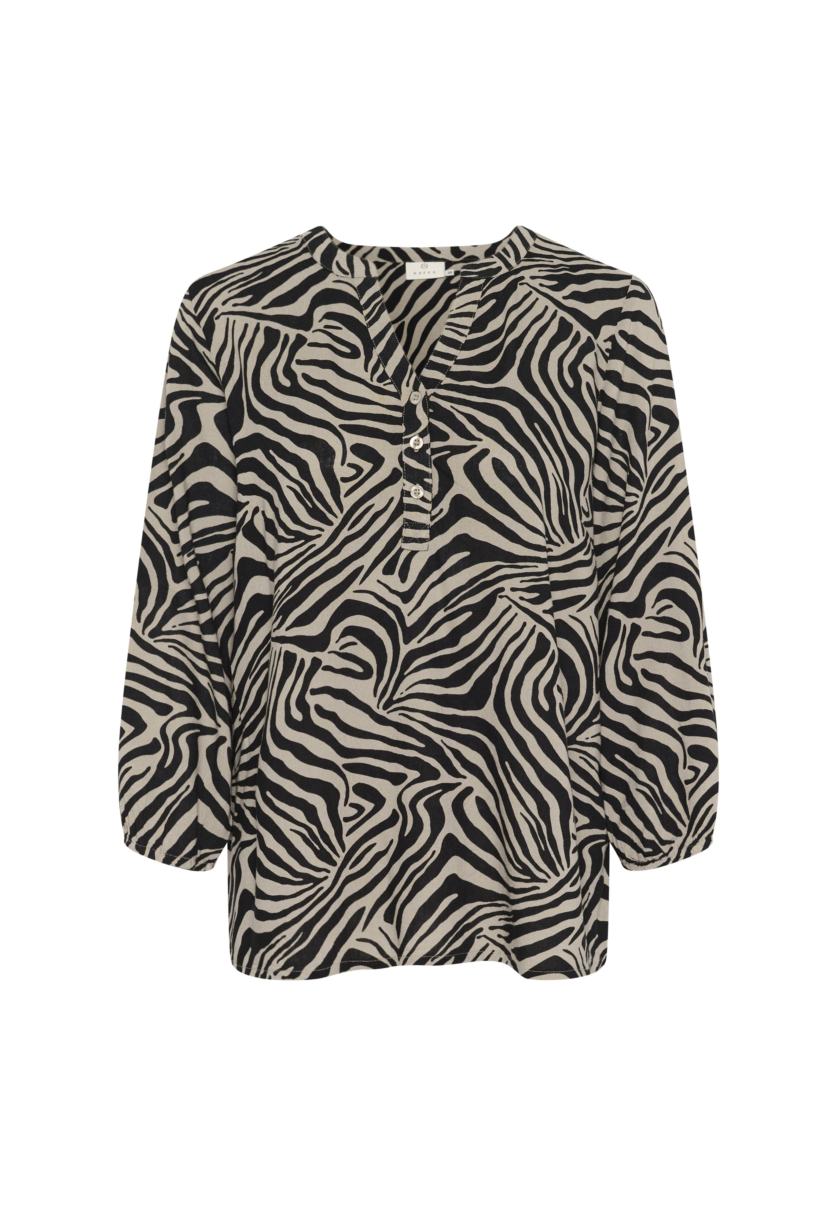 Schwarz-beige Bluse mit langen Ärmeln und Zebra-Muster, V-Ausschnitt und drei Knöpfen vorne. Weicher, leichter Stoff.