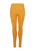 Gelbe, gerippte Leggings mit hohem Bund und zwei Seitentaschen, aus einem dehnbaren, weichen Material für Komfort und Flexibilität.