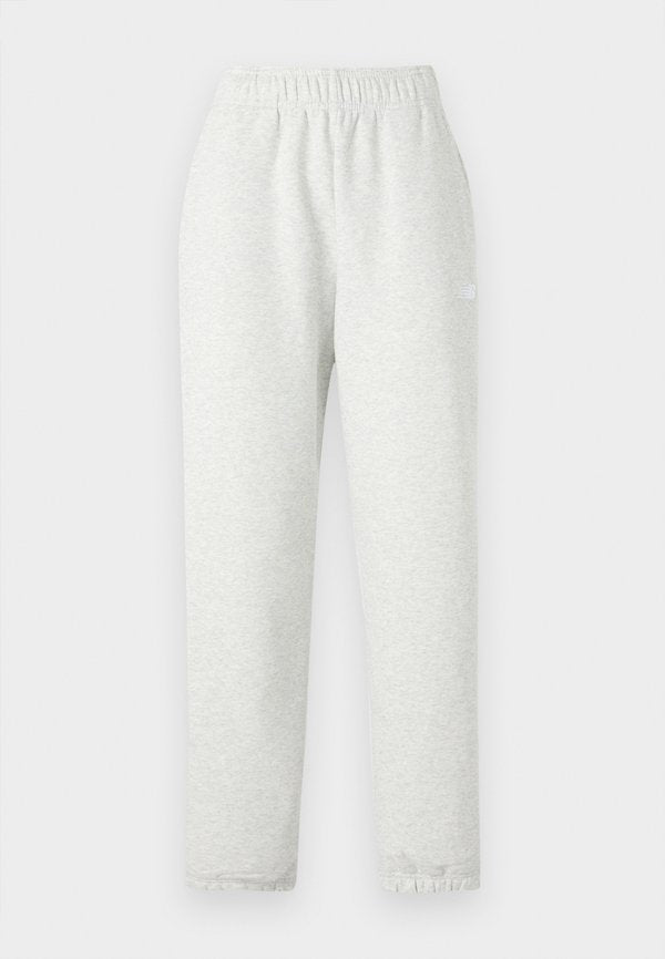 New Balance SPORT ESSENTIALS JOGGER - Tracksuit bottoms - grey