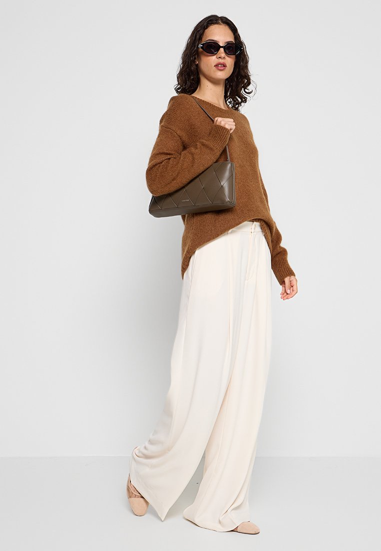By Malene Birger BRIELLA