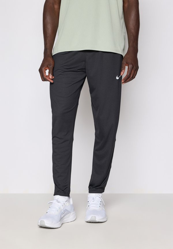 Nike Performance Tracksuit bottoms - black/reflective silver-coloured
