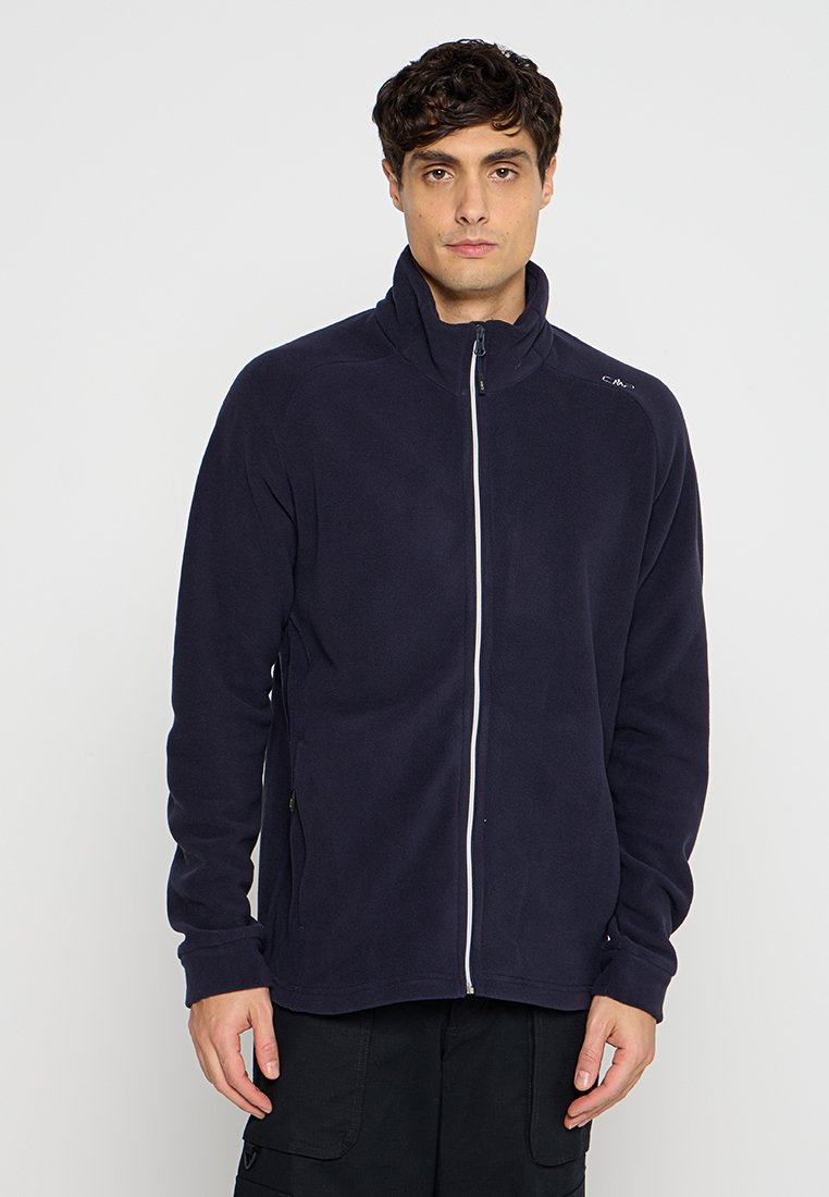 Marineblaue Fleecejacke mit hohem Kragen, durchgehendem Reißverschluss und weißen Reißverschlussakzenten. Verfügt über Seitentaschen und eine glatte Textur.