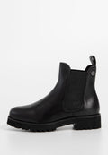 Schwarzer Chelsea-Stiefel aus Leder mit elastischen seitlichen Einsätzen und einer Ziehlasche. Verfügt über eine klobige Gummisohle mit Profil für besseren Halt.
